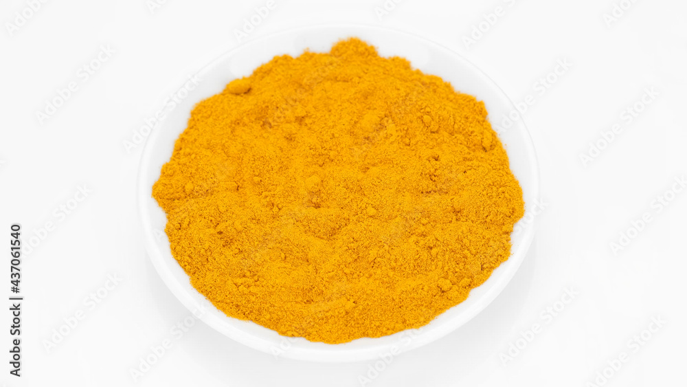 turmeric powder top view on white background. Condiment or dietary supplement. turmeric powder top view on white background. Condiment or dietary supplement.