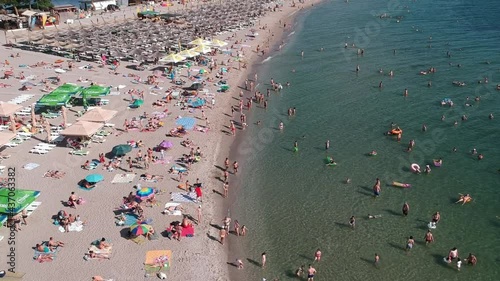 Lots of people enjoying the sea and the beach. Drone footage. Croatia,Sunj Bay, Lopud Island. July, 20, 2019 photo