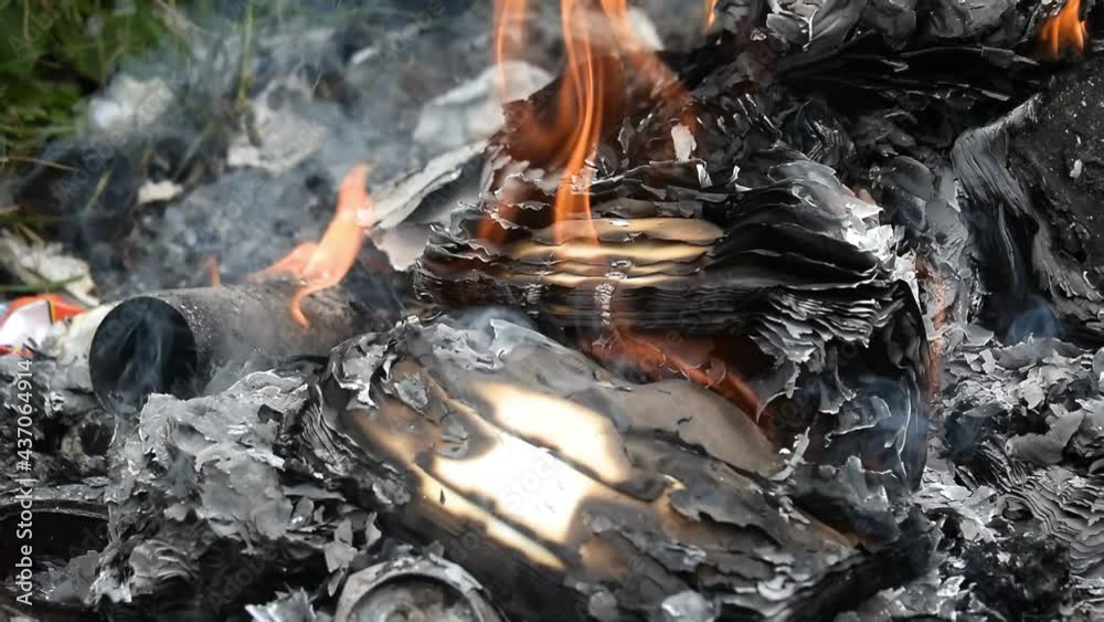 Diary, books and secret documents, letters set on fire. Burnt papers. Diary, books and secret documents, letters set on fire. Burnt papers.