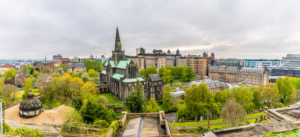 A panorama view from the Necropolis towards the Cathedral and hospital districts in Glasgow on a summers evening 