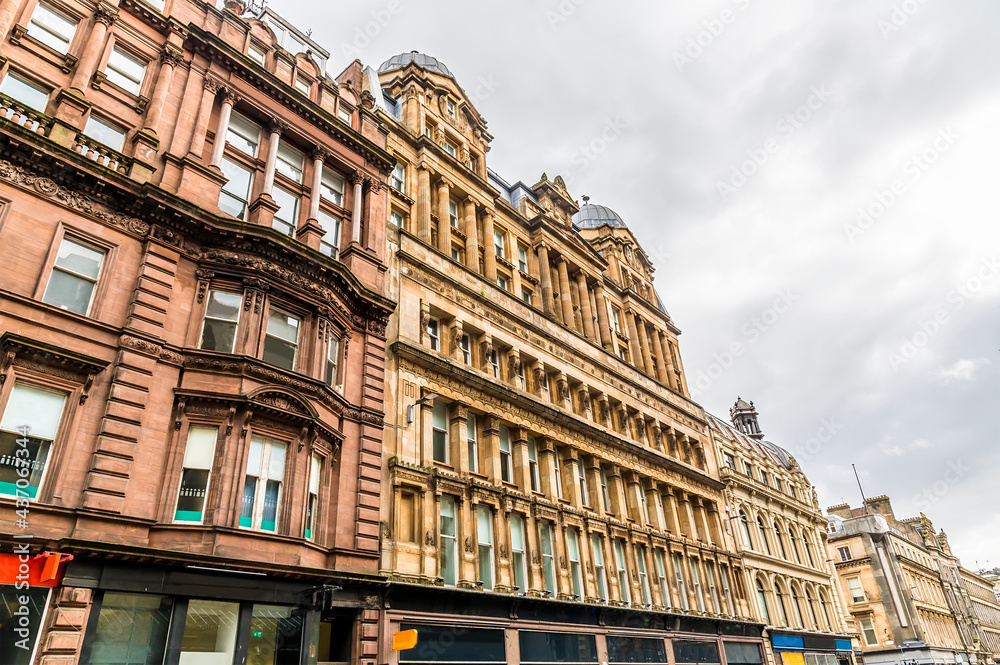 A view along a row of Victorian buildings  in Glasgow on a summers day