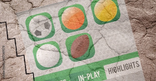 Composition of sports balls on green signs over cracked soil surface