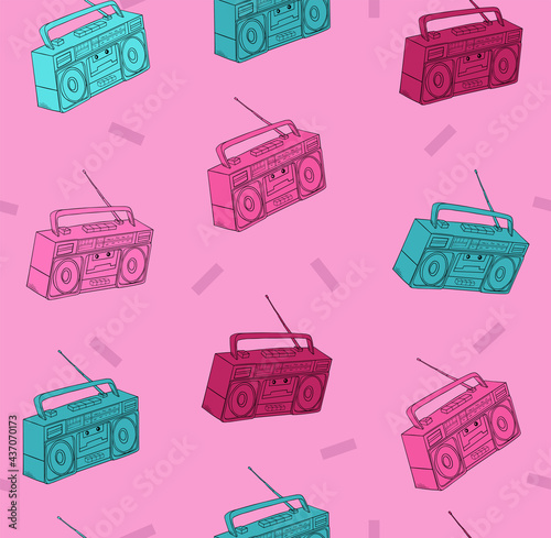 seamless pattern of colored random placed cartoon retro tape recorders, pink and green
