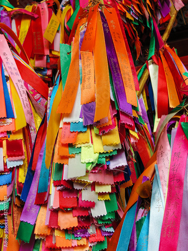 Many colorful ribbons with wishes hangs in the temple. Georgetown, Penang, Malaysia