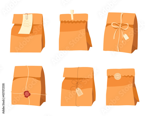 Craft bags. Kraft shopping bags. Set of paper gift bags with stickers, ribbons, stamps and tags. Recycled bulk paper bags without handles. Vector illustration isolated on white 