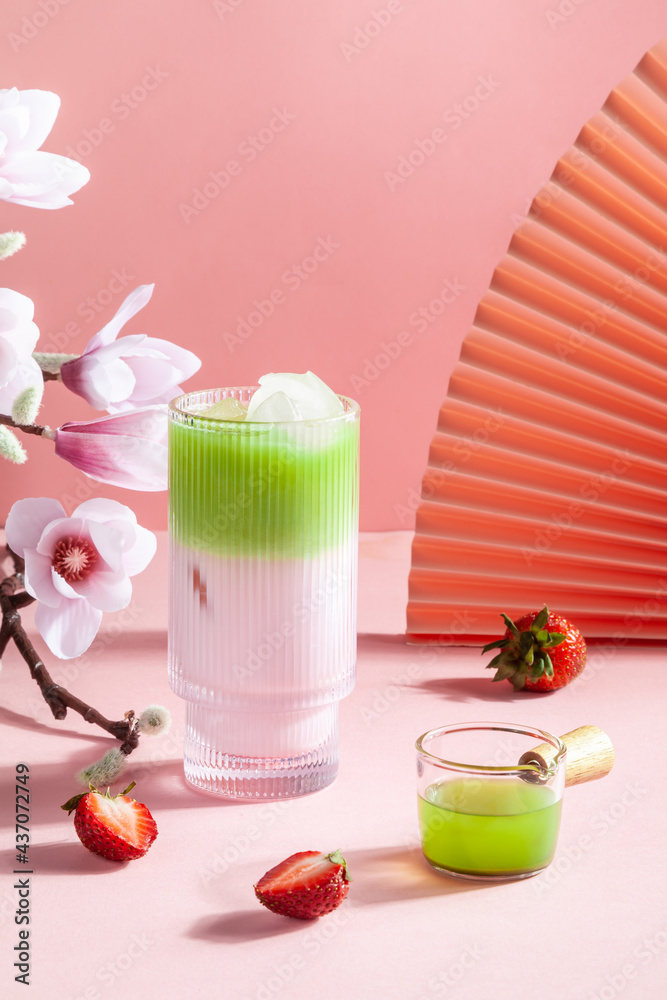 Strawberry matcha latte in a glass cup. Strawberry matcha latte in a glass cup.