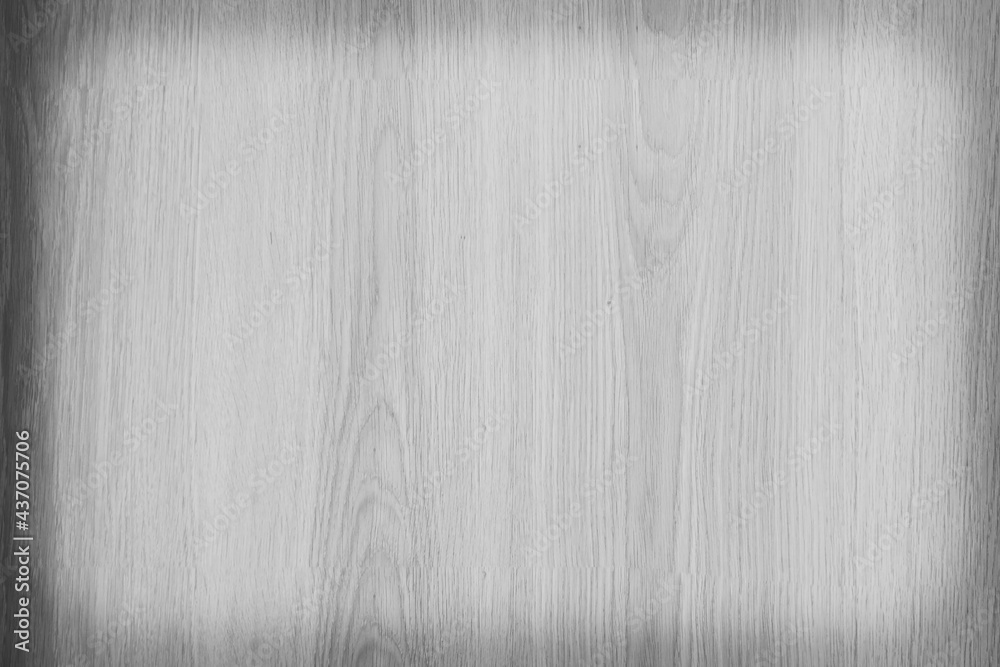 Old plywood surface made into a black and white image. The softness of the ply stripes plywood surface for the background. Black and white background of old plywood texture. Old plywood surface made into a black and white image. The softness of the ply stripes plywood surface for the background. Black and white background of old plywood texture.