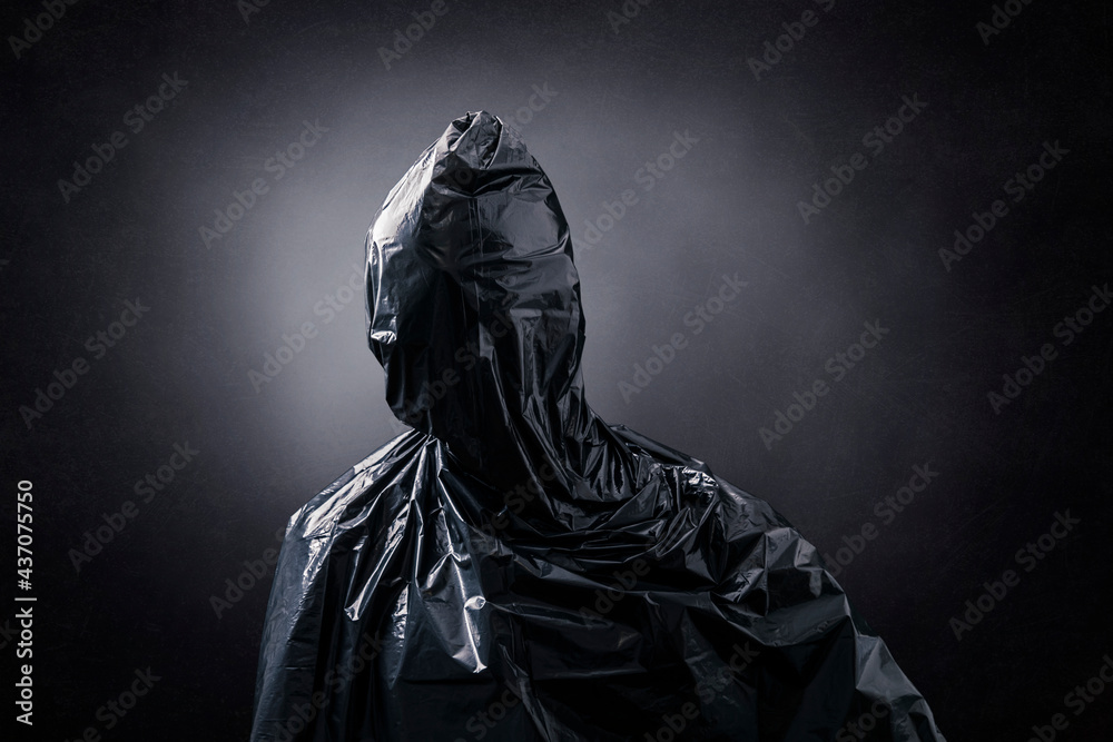 Creepy figure over dark misty background Creepy figure over dark misty background