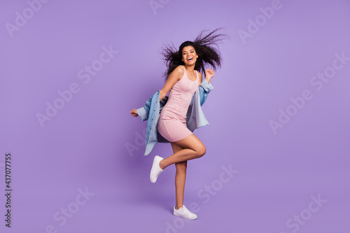 Full length body size photo laughing overjoyed with flying hair relaxing dancing on weekend isolated pastel purple color background