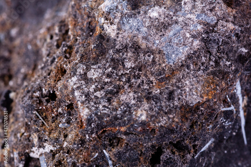 stone macro mineral ilmenite on a white background photo