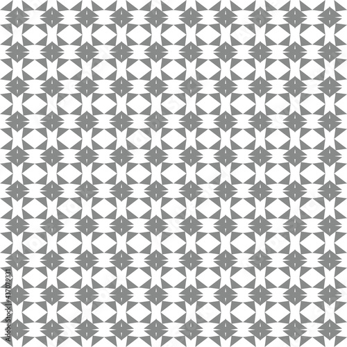 Creative composition with the image of gray geometric shapes on a white background. Seamless background  abstraction. Material for printing on paper or fabric.