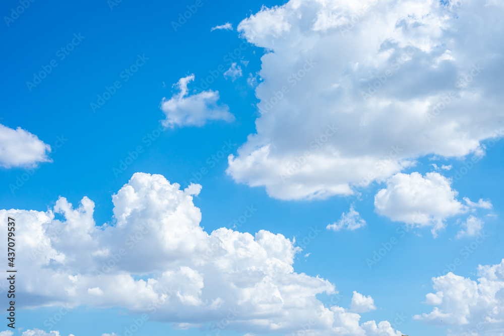 many white clouds in the blue sky many white clouds in the blue sky