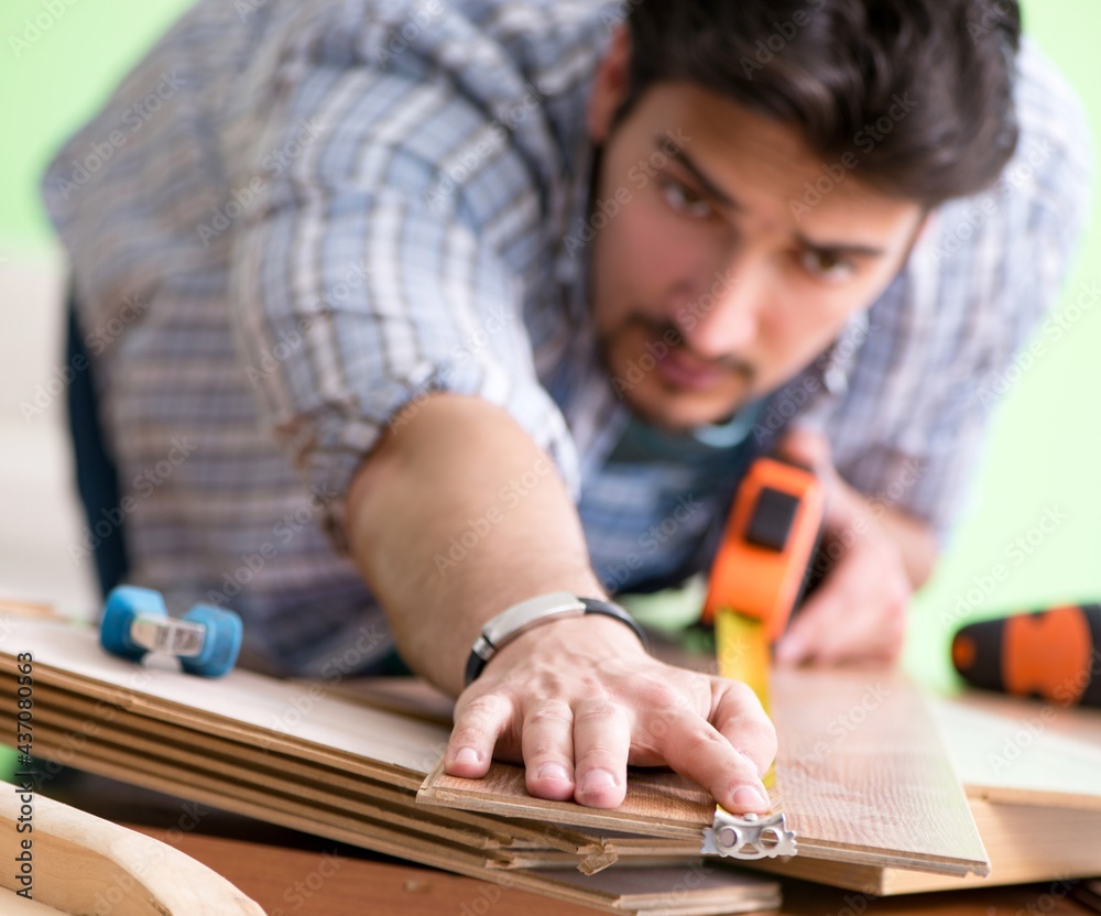 Woodworker working in his workshop Woodworker working in his workshop