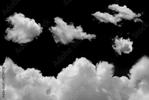 Set of isolated clouds on black background.