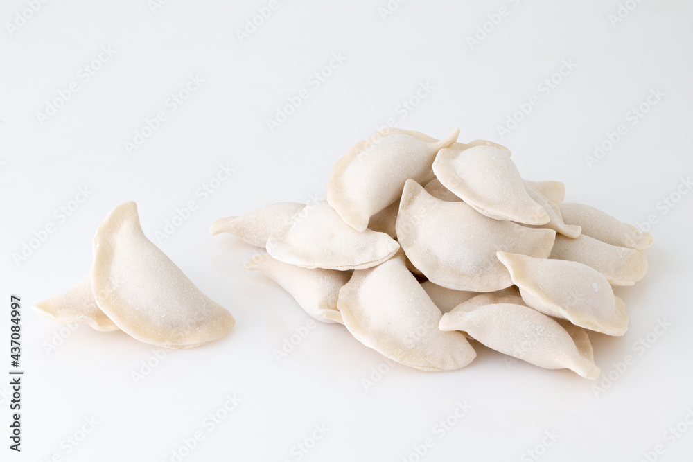 Fototapeta premium frozen dumplings on white background