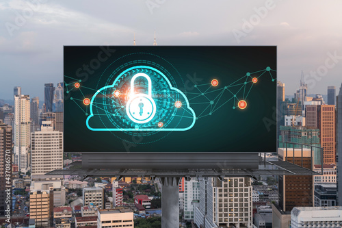 Photography Padlock icon hologram on road billboard over panorama city view of Kuala Lumpur at sunset to protect business, Malaysia, Asia