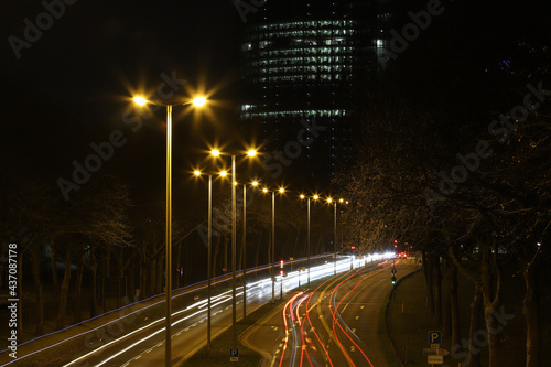 illuminated road of a city at night