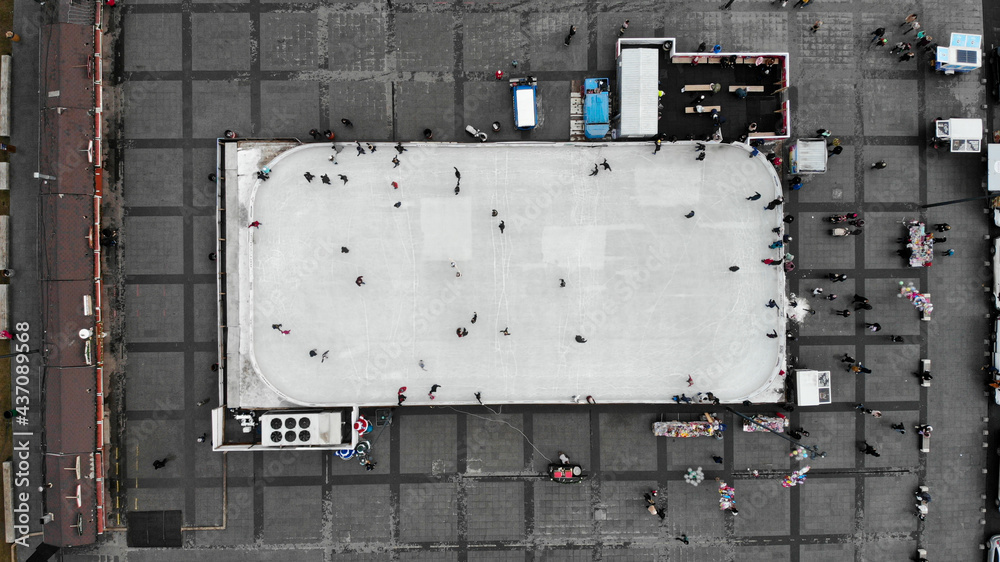 Top view of the ice rink in the middle of the square where adults and children skate. Nikolaev, Ukraine Top view of the ice rink in the middle of the square where adults and children skate. Nikolaev, Ukraine