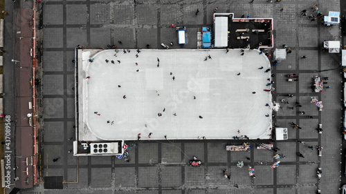 Top view of the ice rink in the middle of the square where adults and children skate. Nikolaev, Ukraine