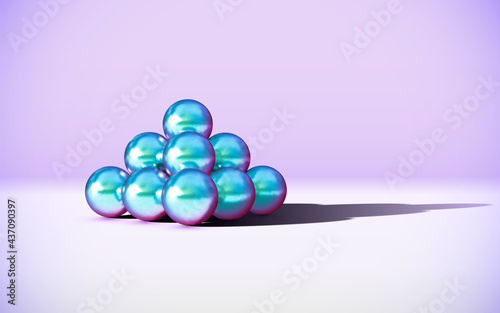 Chrome metal balls in pyramid stack with abstract calm and relaxing background