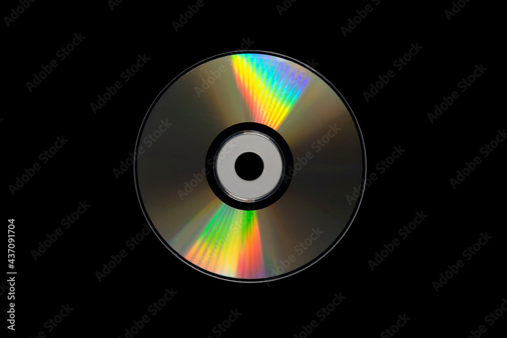 cd or dvd, storage data information technology. music and movie record.  holographic side of the compact disc. a compact disc isolated on black  background. Stock Photo | Adobe Stock