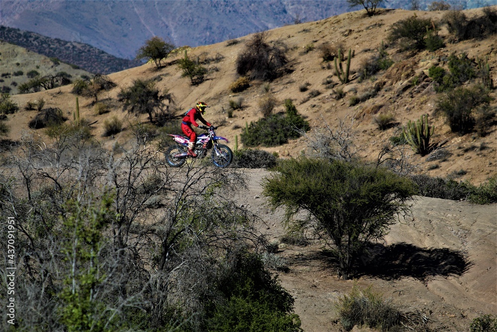 young motorcycle racer training in the mountains young motorcycle racer training in the mountains