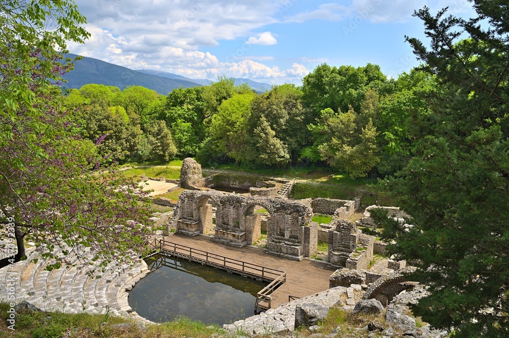 The ruins of Butrint Ancient Theatre around noon