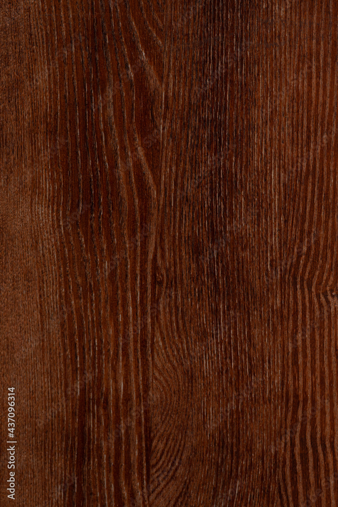Naklejka premium close up of dark brown wooden background