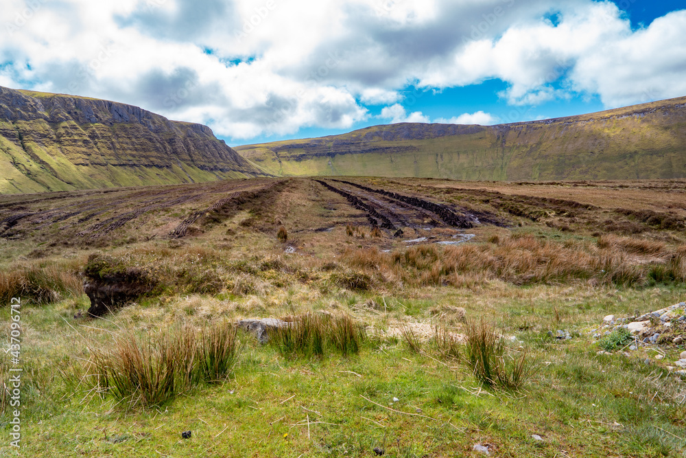 Peat cutting between Benbulbin and Benwiskin in County Sligo - Donegal