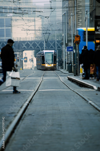 Dublin LUAS Tram pulling into a stop within the city centre.