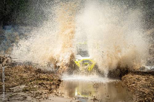 Amazing view of active ATV and UTV driving in mud water