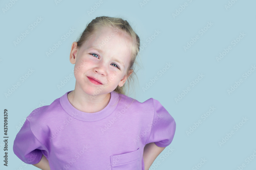 Blonde girl isolated on a uniform background