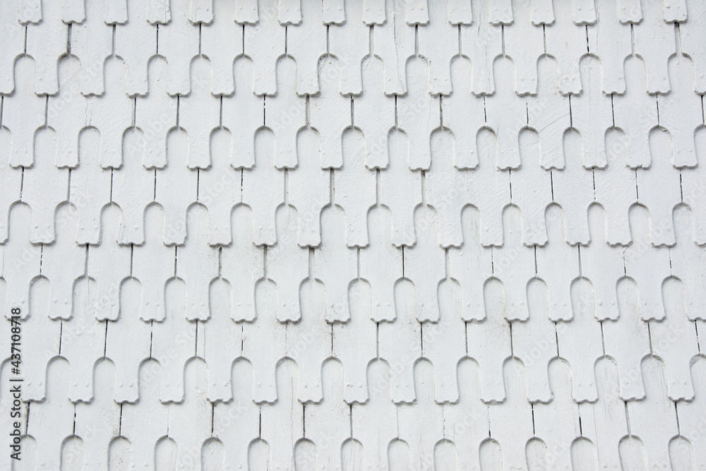 Fototapeta premium White vintage wooden facade tiles. Exterior panels. Old texture