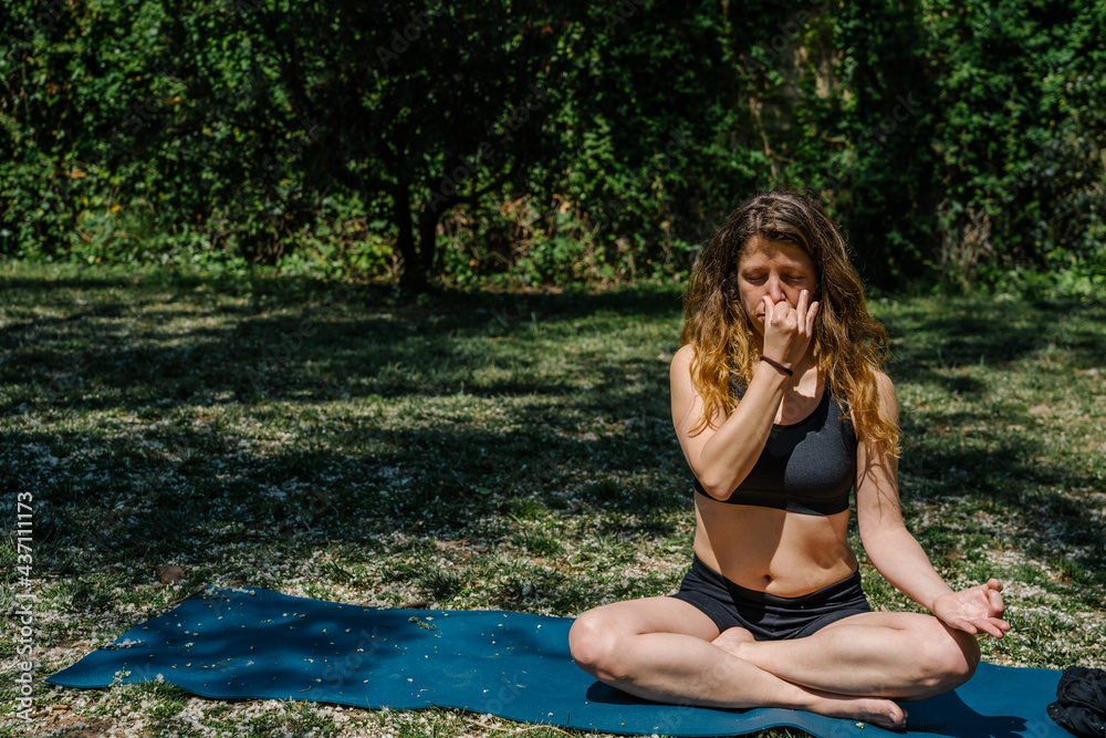 Breathing exercise Pranayama - Alternate nostril breathing, often performed for stress and anxiety relief