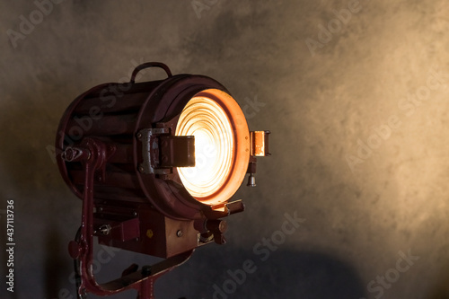 Fotografi Old movie projector with a lens and a hot lamp