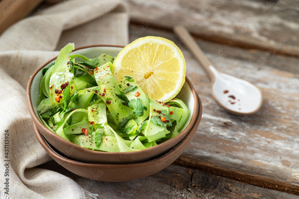 Fresh salad with armenian cucumber, dry chili and herbs Fresh salad with armenian cucumber, dry chili and herbs