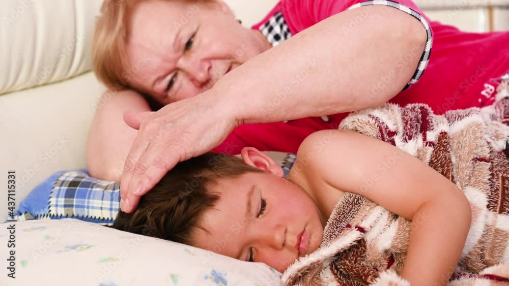 Grandma sleeps with her grandson 