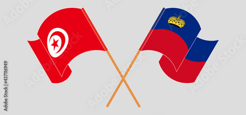 Crossed and waving flags of Tunisia and Liechtenstein
