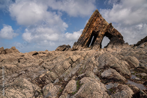 Beautiful landscape image of Blackchurch Rock on Devonian geological formation on beautiful Spring day photo