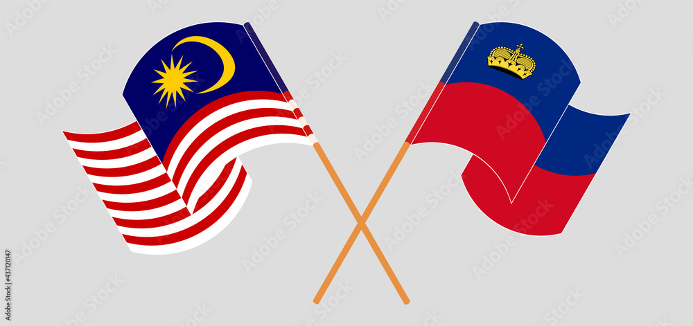 Crossed and waving flags of Malaysia and Liechtenstein