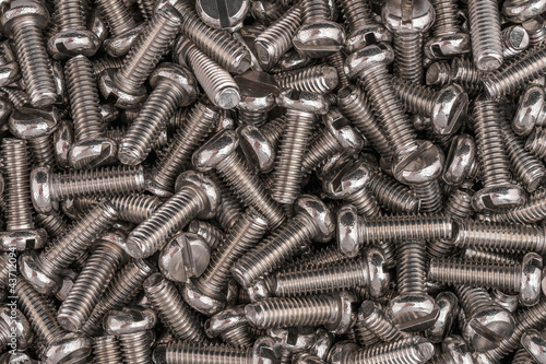 Macro photo of stainless flat head screws.