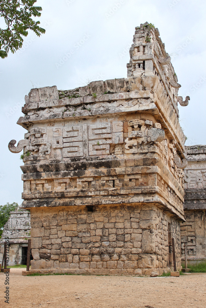 La Iglesia or the Church, a small temple bearing many masks in the Las Monjas complex on the territory of the archeological site Chichen Itza, Yucatan, Mexico