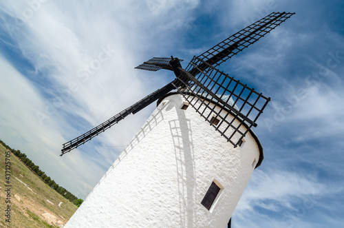 Traditional Spanish windmill in Campo de Criptana, Spain, on the famous Don Quixote Route