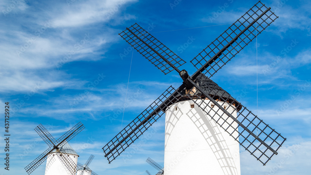 Landscape with windmills in Campo de Criptana, Spain, on the famous Don Quixote Route Landscape with windmills in Campo de Criptana, Spain, on the famous Don Quixote Route