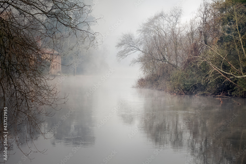Misty river at dawn Misty river at dawn
