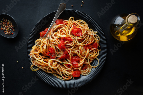 Tomato pasta with cheese on plate