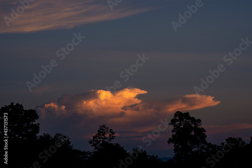 Beautiful clouds at sunrise with dramatic light. Situation in the sky in the morning. Sunrise, landscape. Image have Noise and Film Grain. Soft focus.