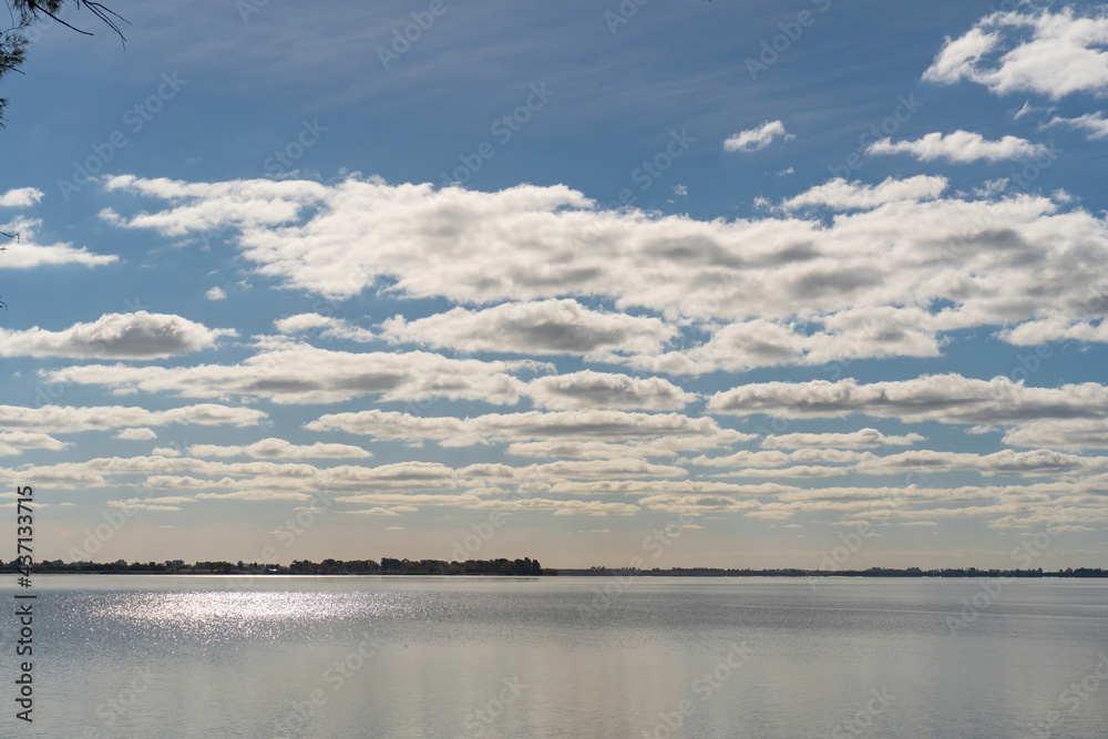 Obraz premium quiet lagoon with small wooden pier and birds resting in Argentina
