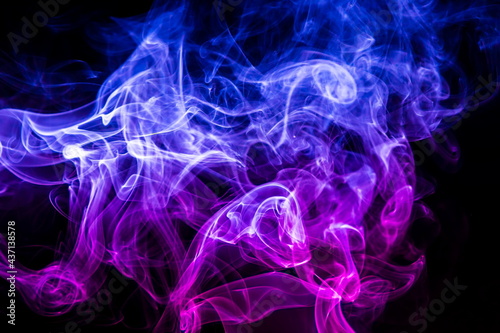 Colored smoke on black background