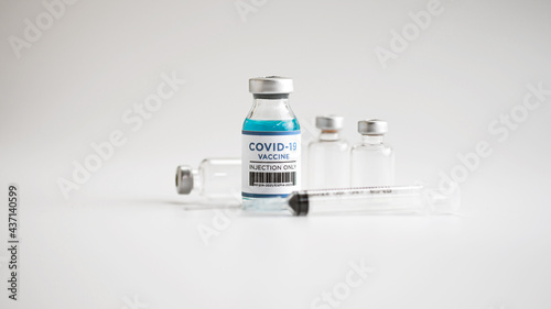 vaccine for vaccination against covid-19, vaccine bottle, syringe, isolate background, copy space, web banner.